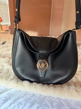 Michael Kors Black Shoulder Bag with Gold MK Emblem